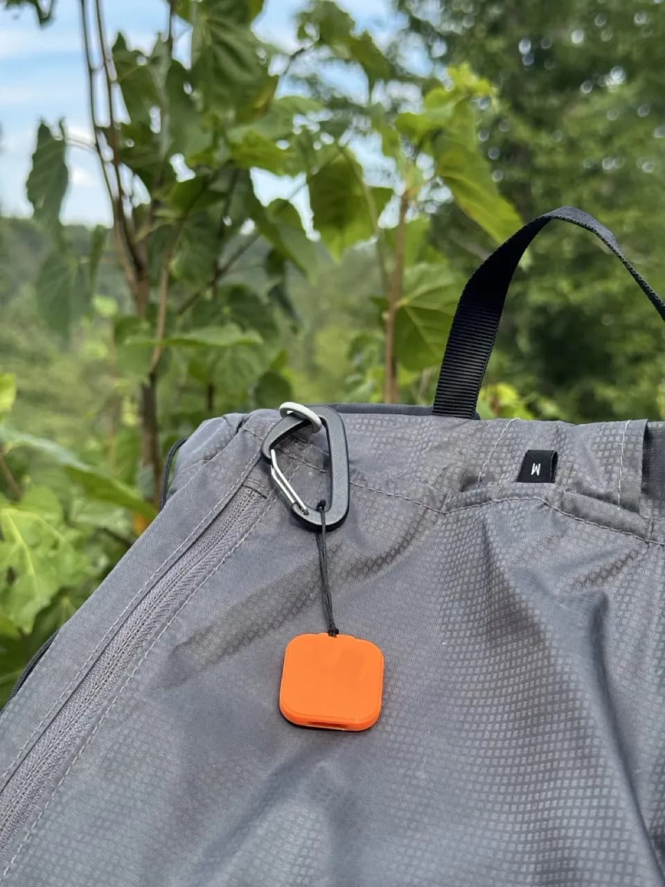 Clipped to a pack, ready for the trail